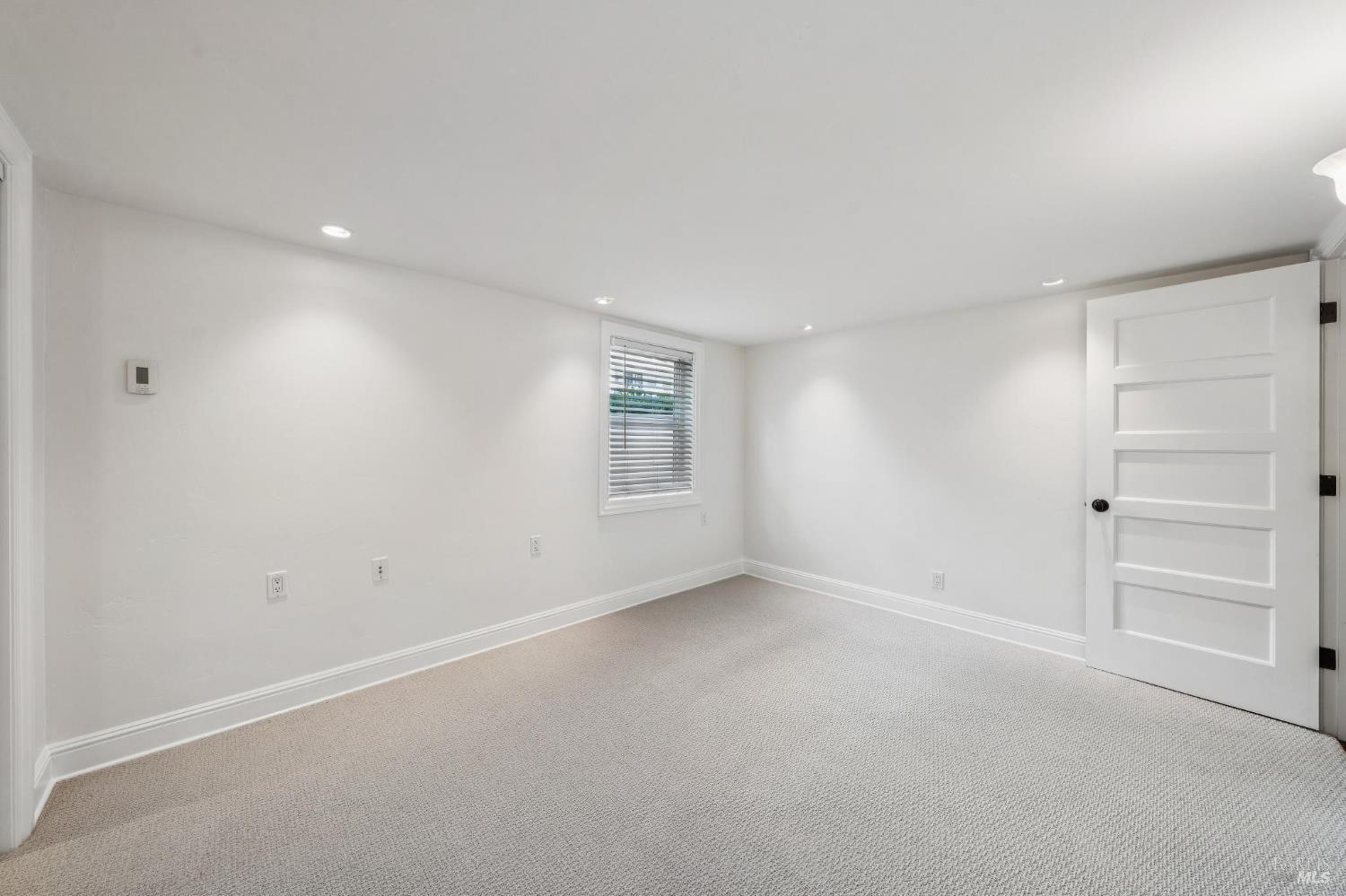 102 F Street San Rafael, CA 94901 - Photo 35 of 80 a view of an empty room with a window
