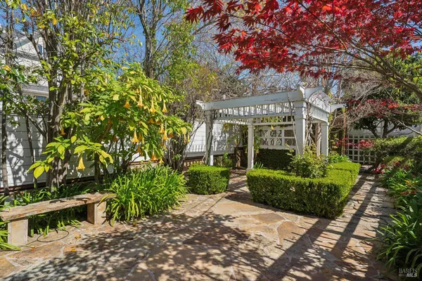 a dining room with a table and chairs