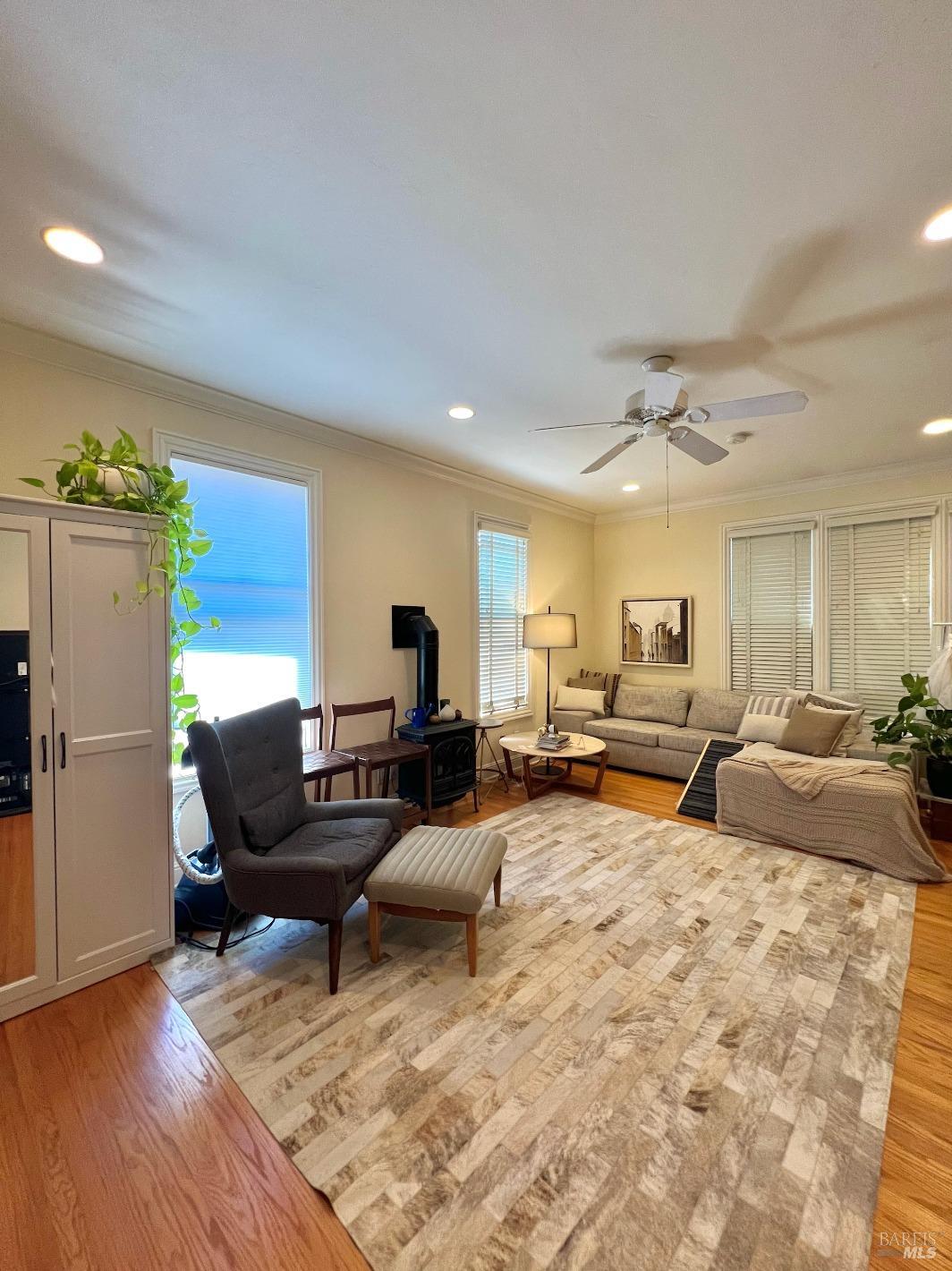102 F Street San Rafael, CA 94901 - Photo 59 of 80 a living room with furniture and a couch