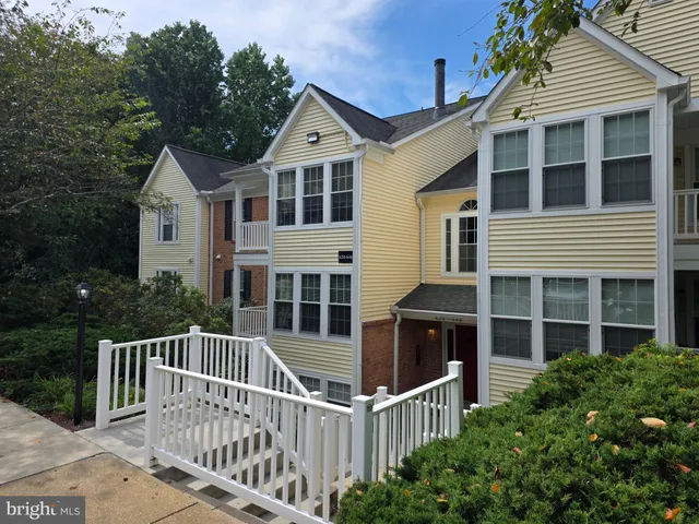 a front view of a house with a porch