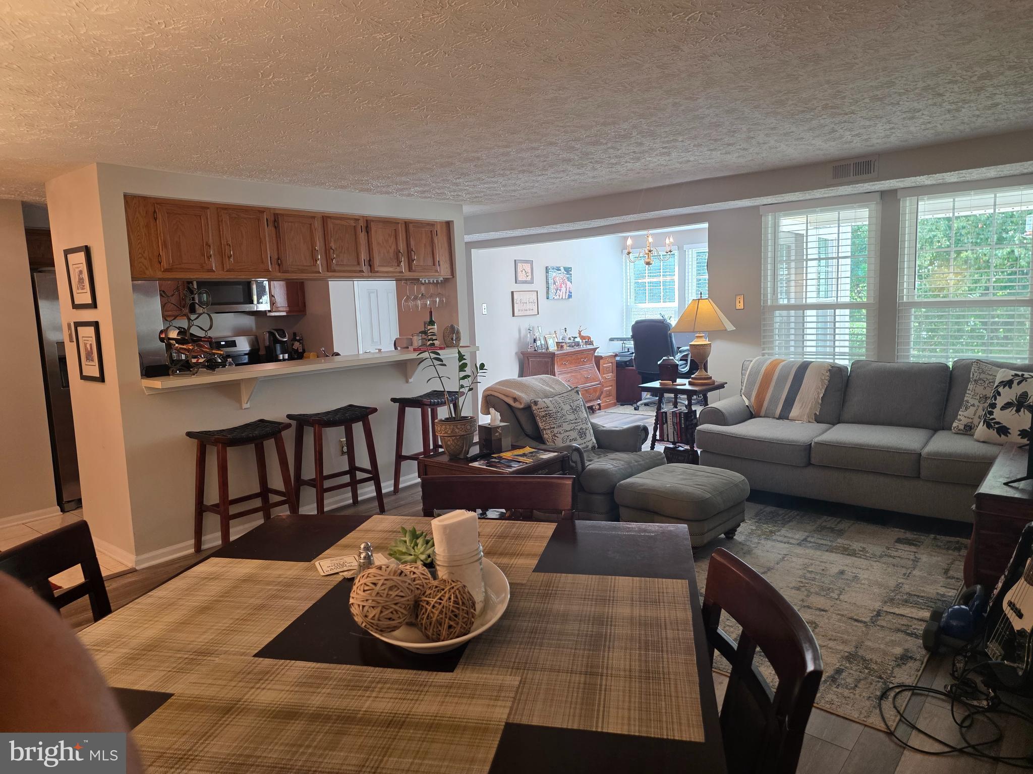 628 Southern Hills Drive, Unit B Arnold, MD 21012 - Photo 7 of 23 a living room with furniture and a large window