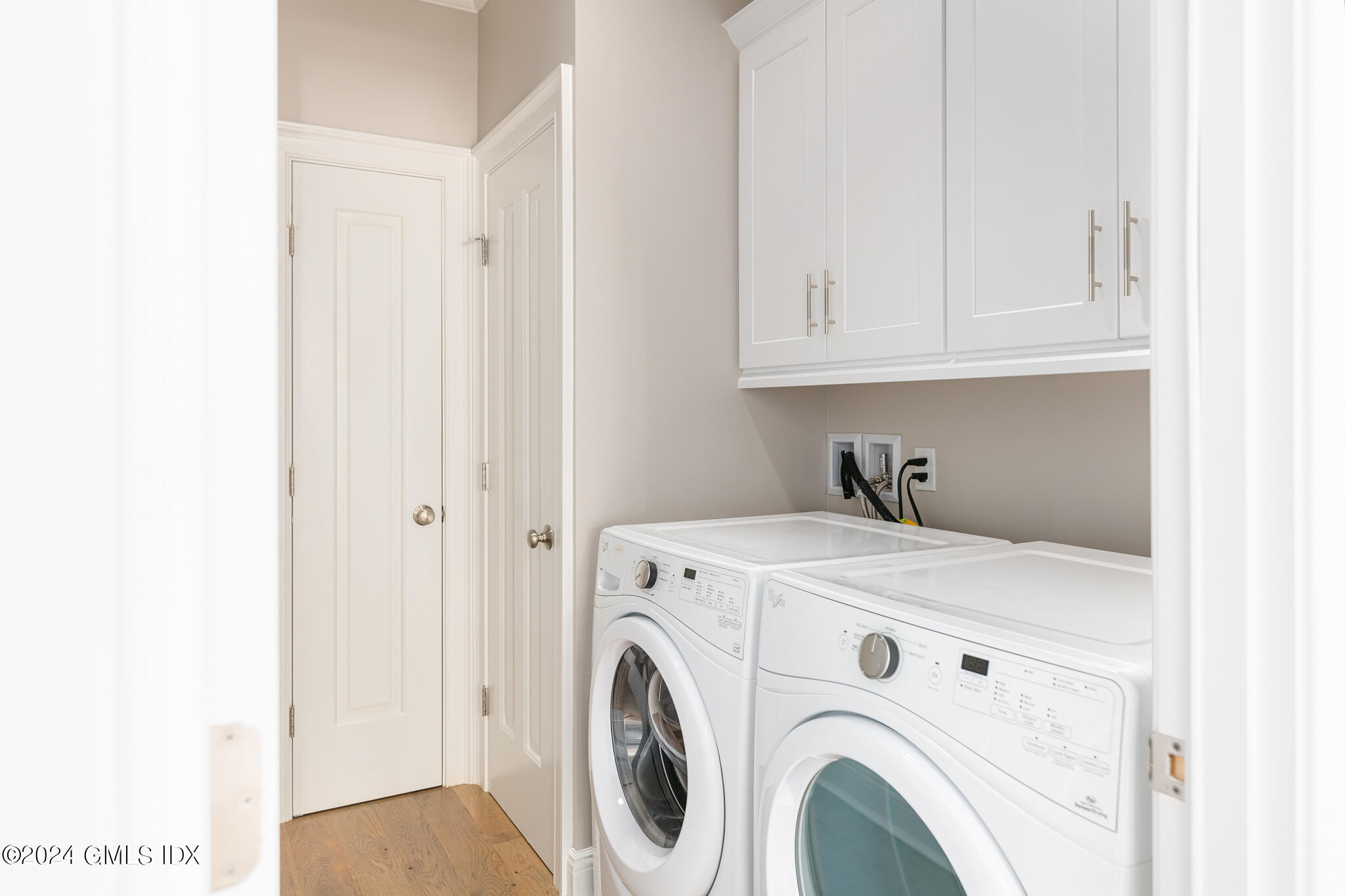 550 River Road Cos Cob, CT 06807 - Photo 11 of 32 a utility room with dryer and washer