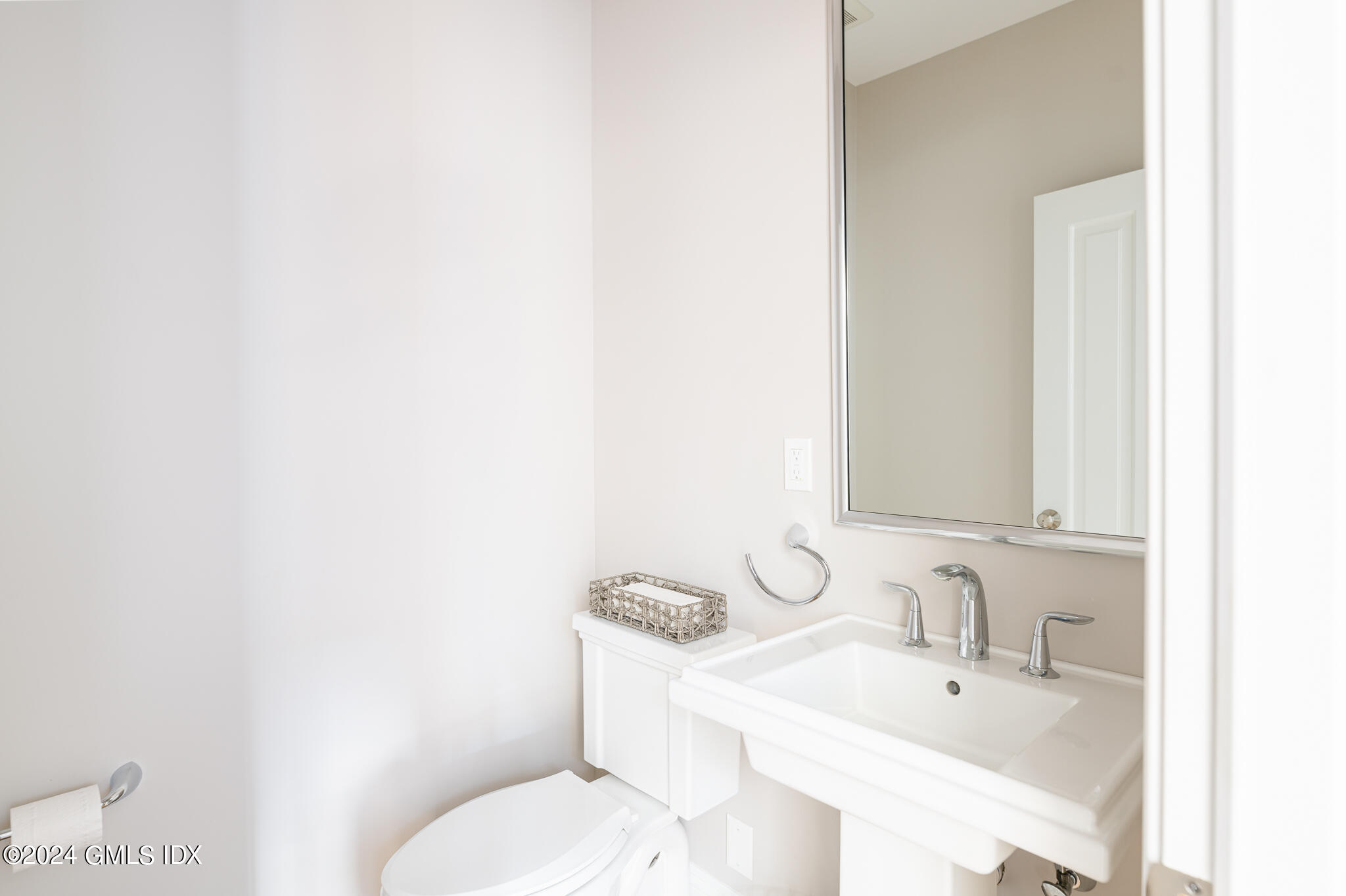 550 River Road Cos Cob, CT 06807 - Photo 10 of 32 a bathroom with a sink and a toilet