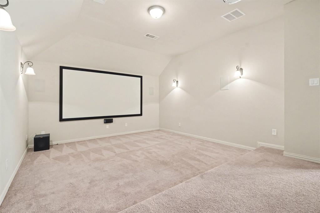 708 Yarrow Street Little Elm, TX 75068 - Photo 23 of 26 a view of a room with window and mirror