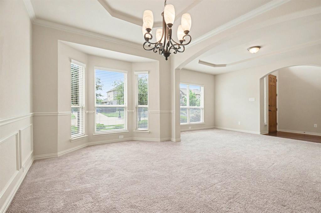 708 Yarrow Street Little Elm, TX 75068 - Photo 7 of 26 a view of an empty room with a window