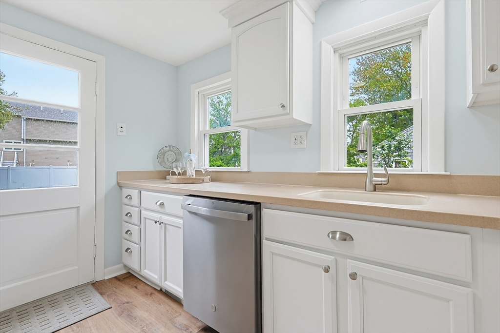 24 Otis Road Barnstable, MA 02601 - Photo 7 of 33 a sink with white cabinets and a sink