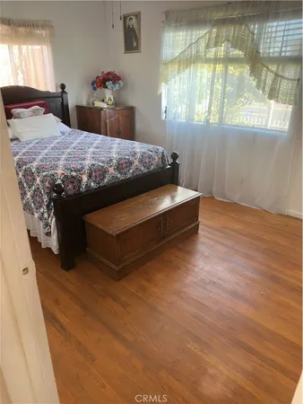a view of a door with wooden floor