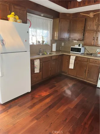 a view of kitchen with furniture and potted plant