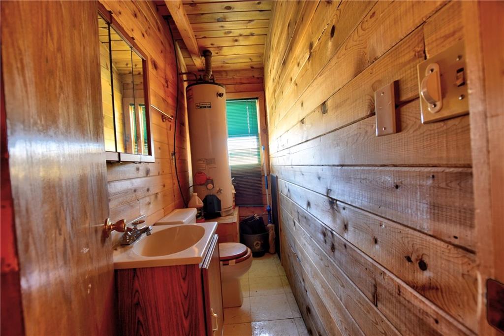 1930 Routt Road Hartsel, CO 80449 - Photo 14 of 23 a bathroom with a sink and a mirror