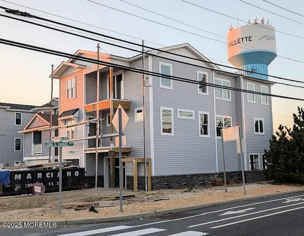 a view of a building with a street