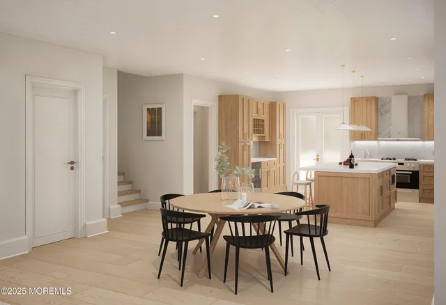 a view of a dining room with furniture and window