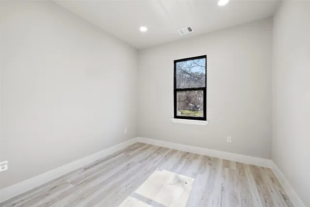 an empty room with a window