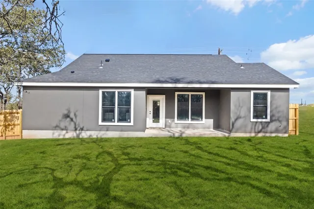 a house view with a garden space