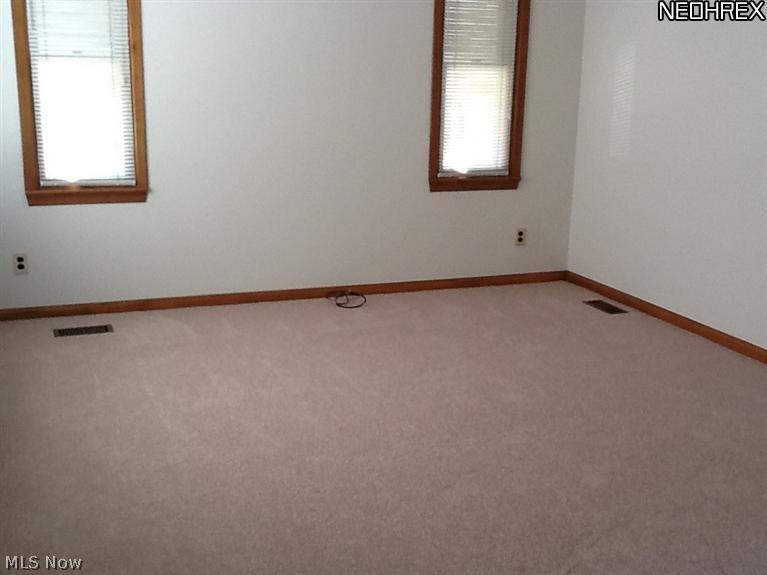 9850 West Pleasant Valley Road Parma, OH 44130 - Photo 15 of 15 Living Room has front window and these 2 side windows give plenty of light to this cozy clean home!