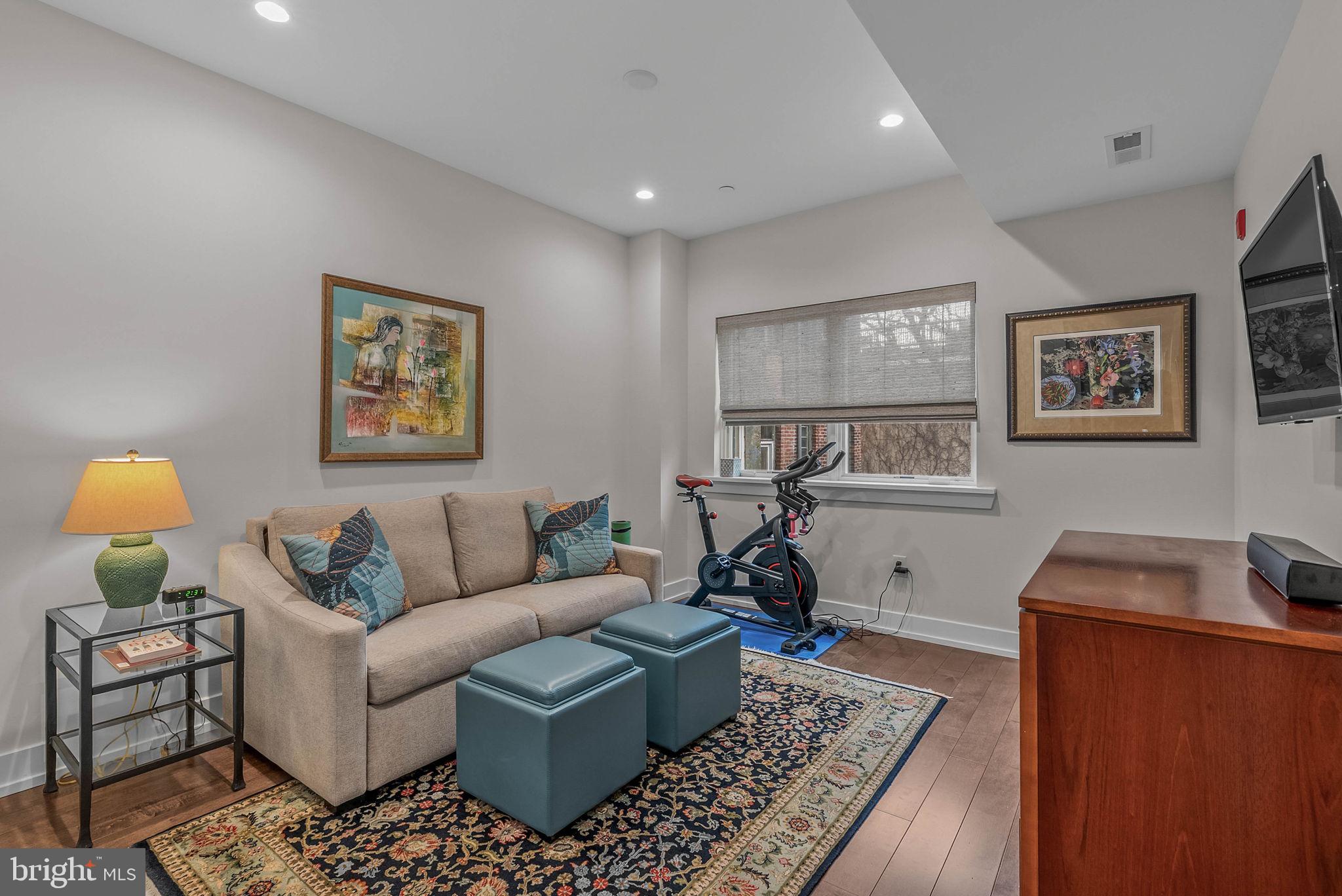 262 South 16th Street, Unit 4 Philadelphia, PA 19102 - Photo 15 of 30 a living room with furniture and a window