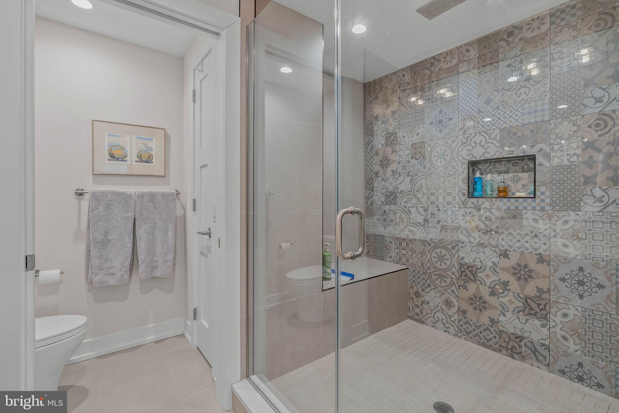 262 South 16th Street, Unit 4 Philadelphia, PA 19102 - Photo 6 of 30 a bathroom with a shower and a toilet