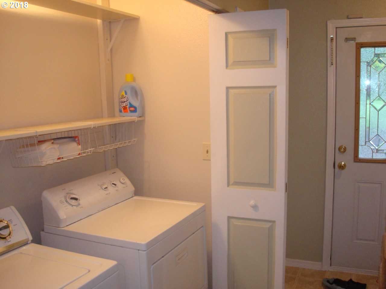 73995 Alder Grove Road Clatskanie, OR 97016 - Photo 5 of 11 a utility room with dryer and washer