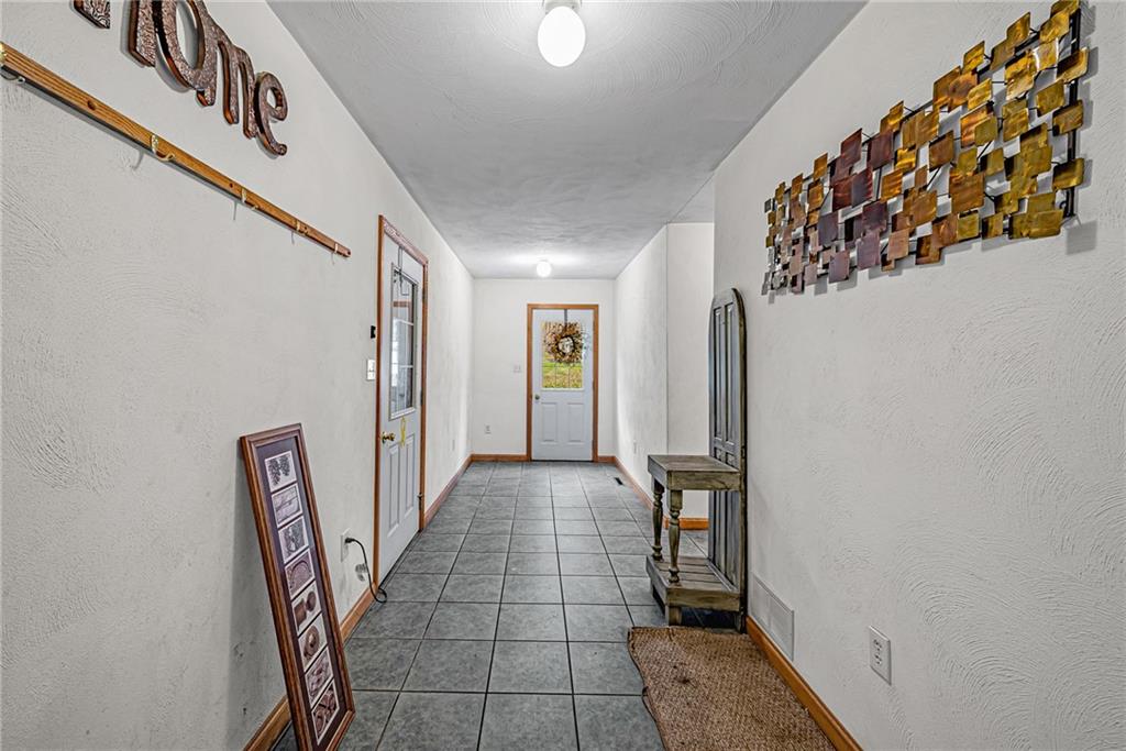 90 Montgomery Church Road Hillsdale, PA 15746 - Photo 12 of 25 a view of hallway with stairs