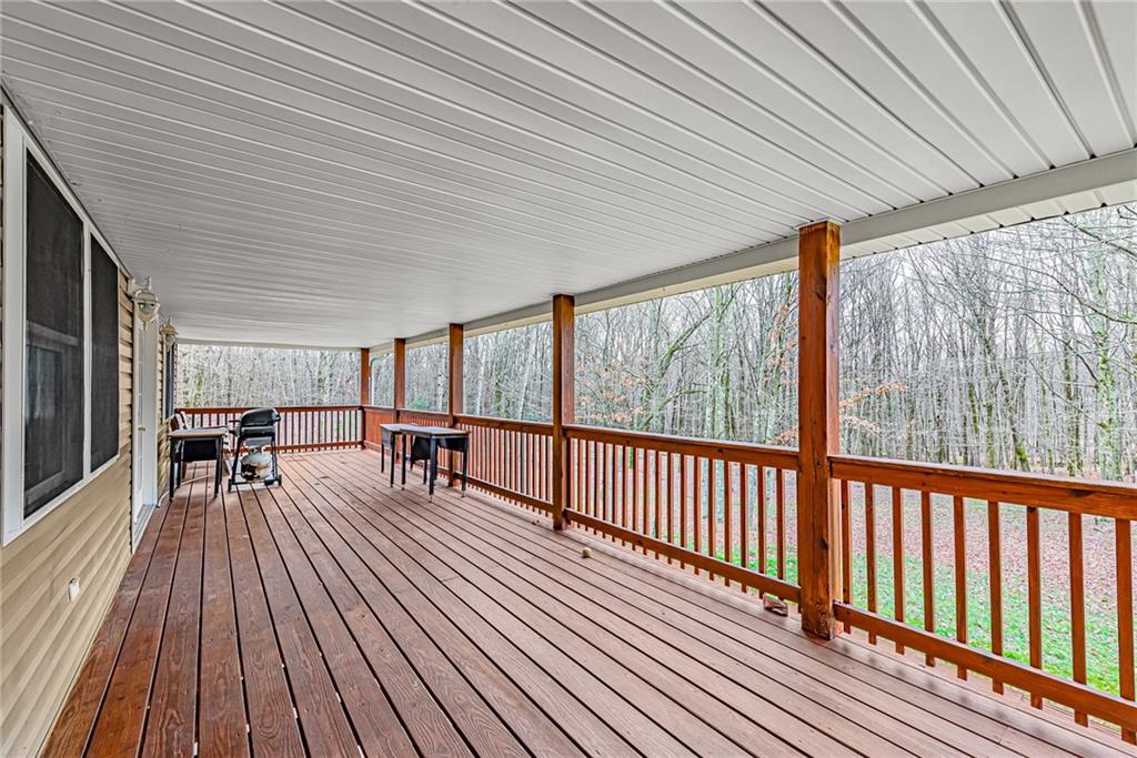 90 Montgomery Church Road Hillsdale, PA 15746 - Photo 19 of 25 a view of dining room and wooden deck