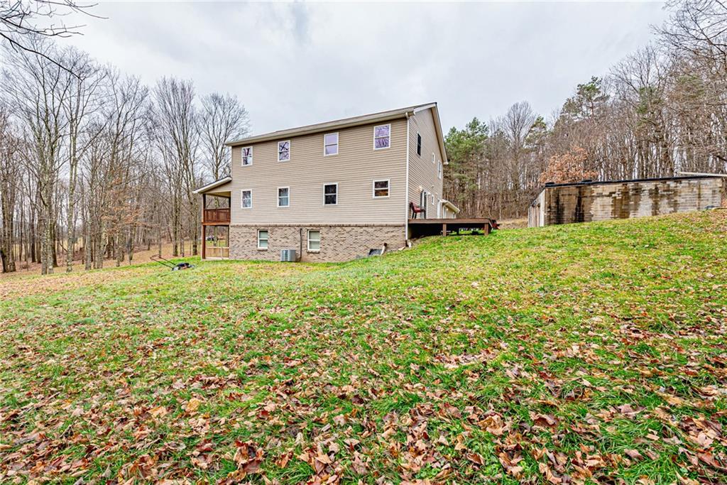 90 Montgomery Church Road Hillsdale, PA 15746 - Photo 20 of 25 a view of a house with a yard