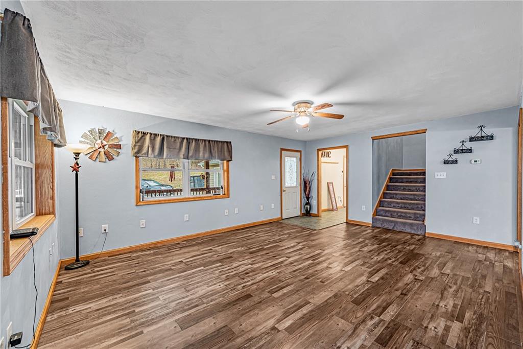 90 Montgomery Church Road Hillsdale, PA 15746 - Photo 4 of 25 a view of an empty room with wooden floor and a window