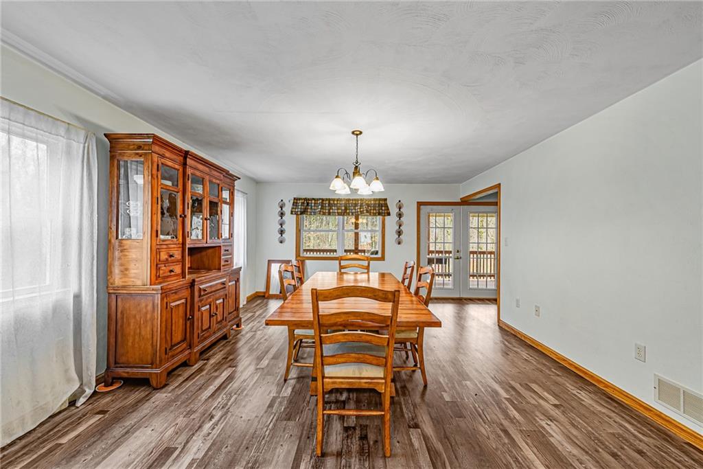 90 Montgomery Church Road Hillsdale, PA 15746 - Photo 5 of 25 wooden floor of a livingroom with furniture window and wooden floor