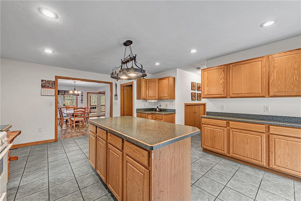 90 Montgomery Church Road Hillsdale, PA 15746 - Photo 10 of 25 a kitchen with stainless steel appliances granite countertop a sink and cabinets