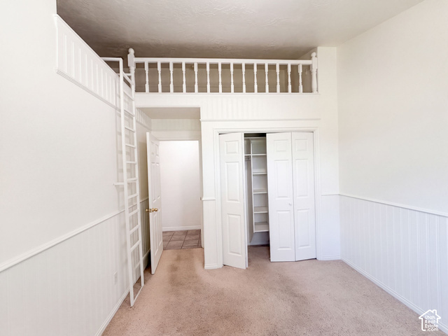 232 Bugle Way Providence, UT 84332 - Photo 16 of 36 Built-in loft with ladder access, interior closet with shelving, and wainscoting paneling