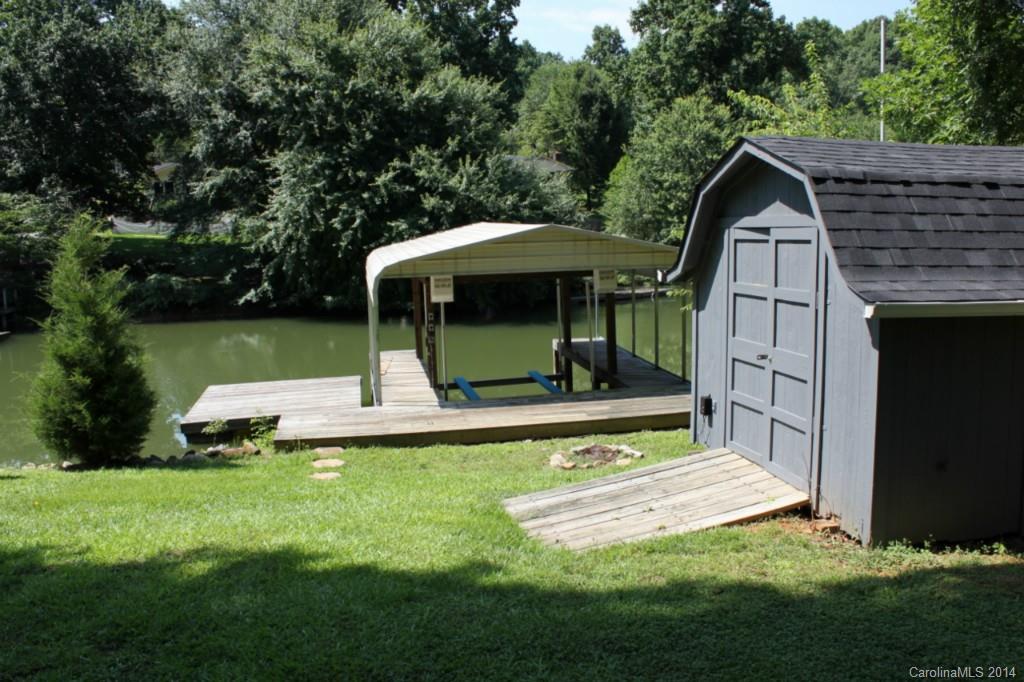 3590 Lake Shore Road South Denver, NC 28037 - Photo 17 of 18 a view of a small house with a yard