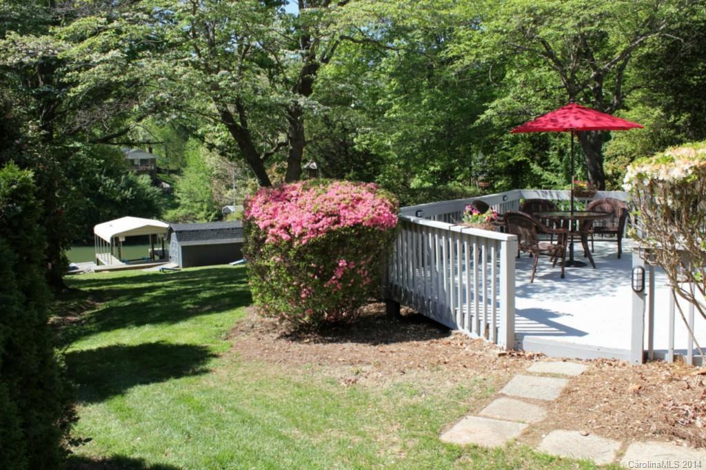 3590 Lake Shore Road South Denver, NC 28037 - Photo 5 of 18 an outdoor space with furniture and umbrella