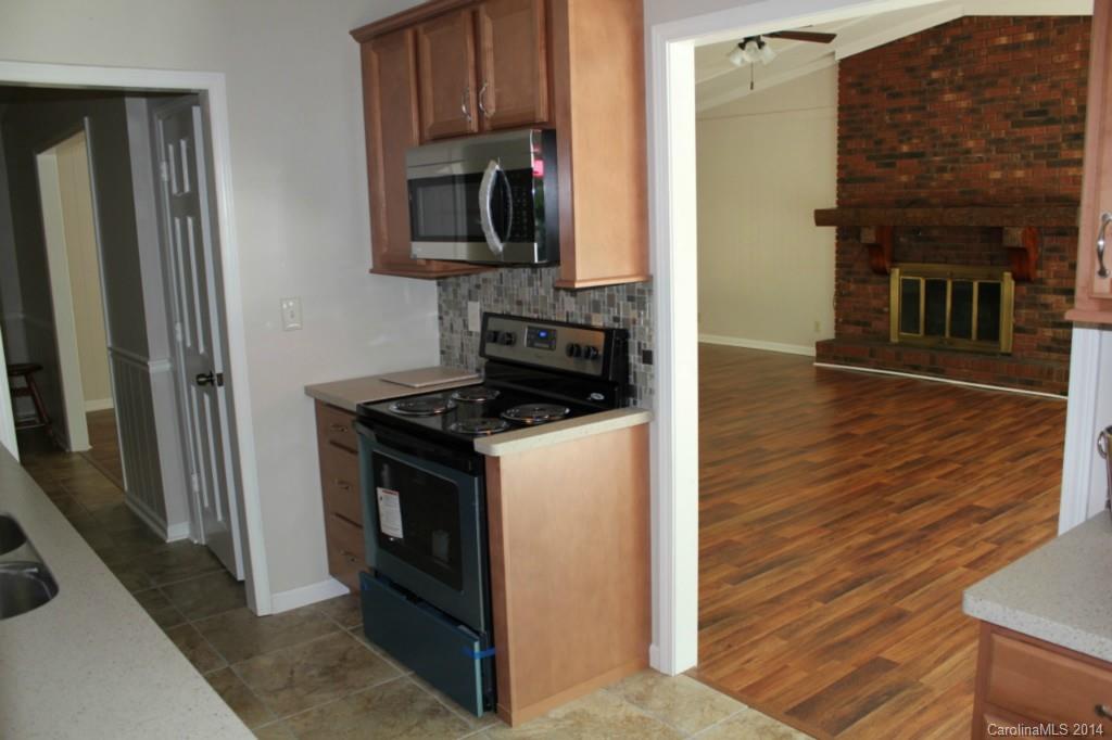 3590 Lake Shore Road South Denver, NC 28037 - Photo 10 of 18 a view of kitchen and utility room