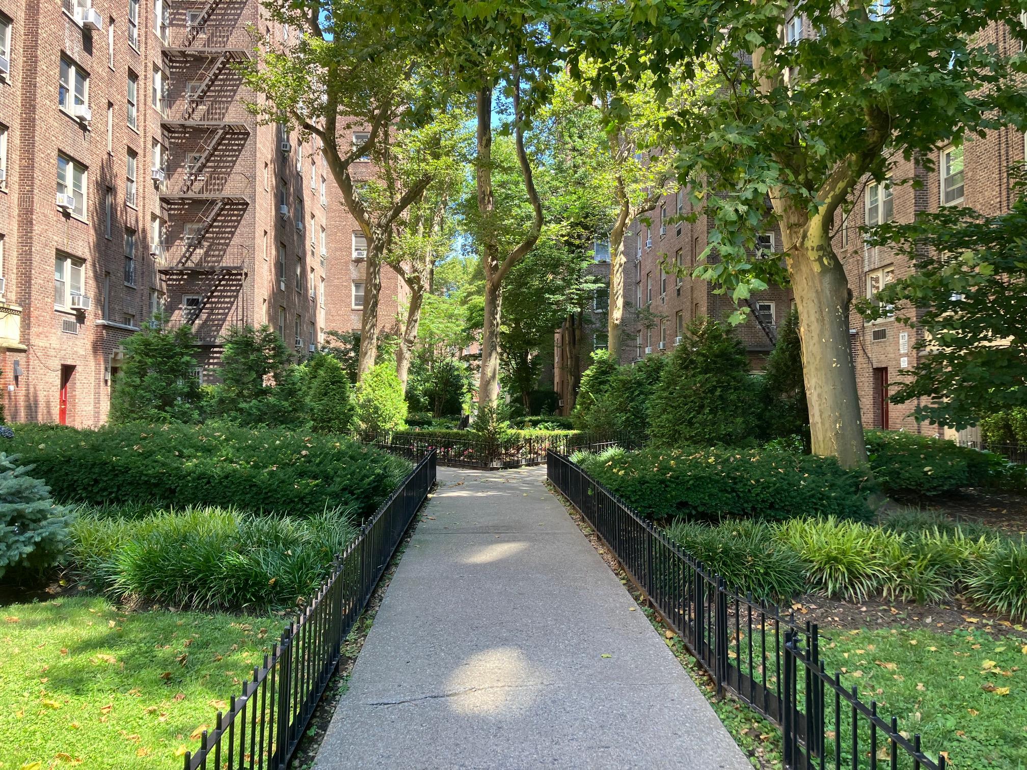 48-55 43rd Street, Unit 2F Queens, NY 11377 - Photo 11 of 13 a view of a pathway of a yard