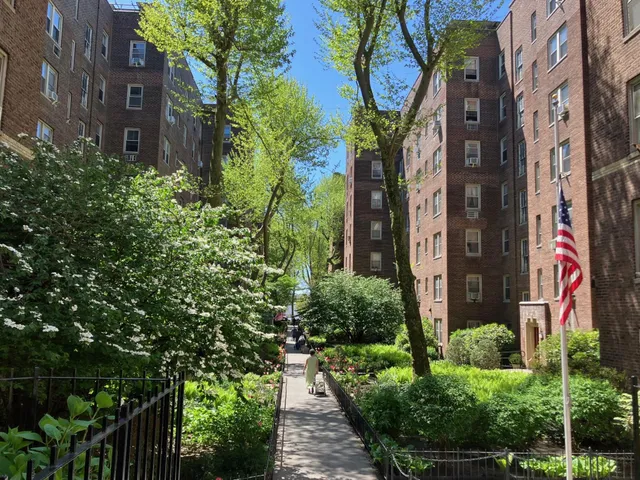 a sign that is on a brick wall