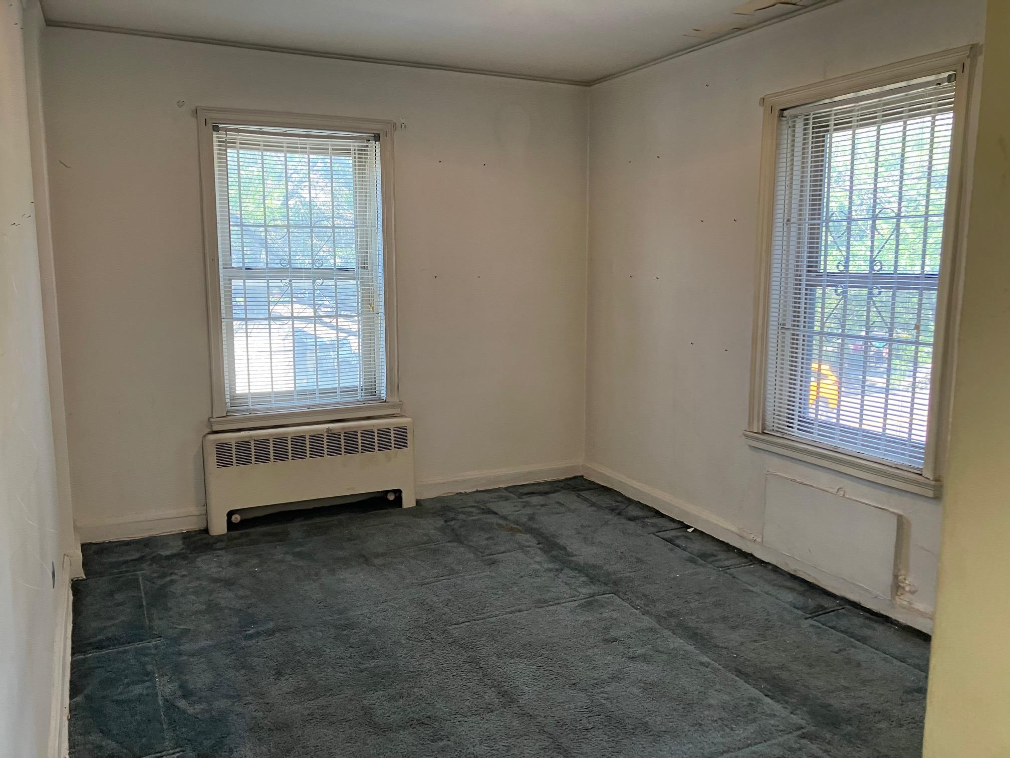 48-55 43rd Street, Unit 2F Queens, NY 11377 - Photo 6 of 13 an empty room with a window
