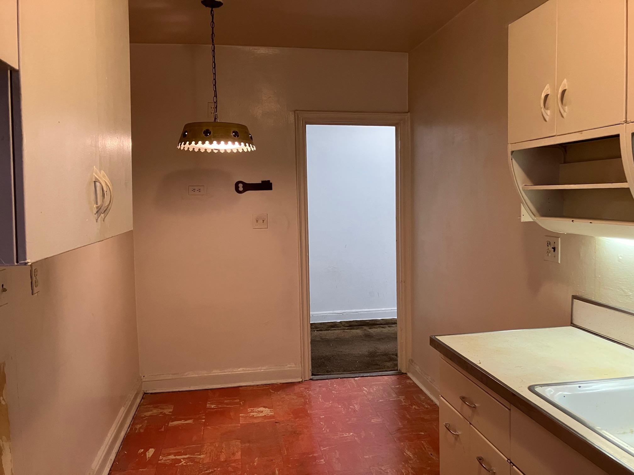 48-55 43rd Street, Unit 2F Queens, NY 11377 - Photo 9 of 13 a view of a kitchen with a sink