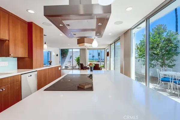 a view of a backyard with chairs