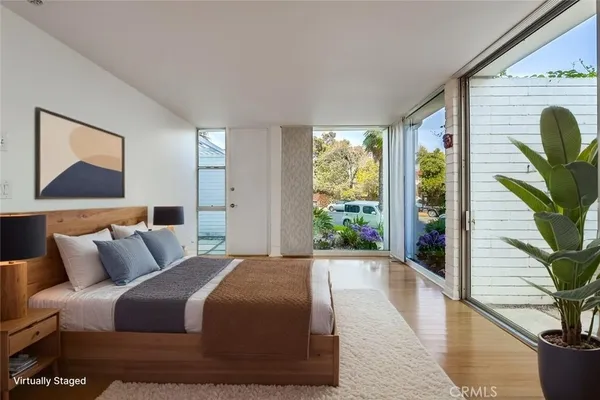 a bathroom with a double vanity sink and mirror