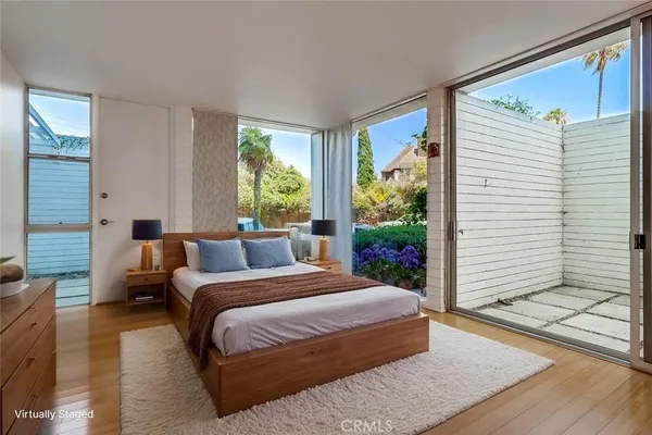 a bathroom with double vanity sink and a mirror