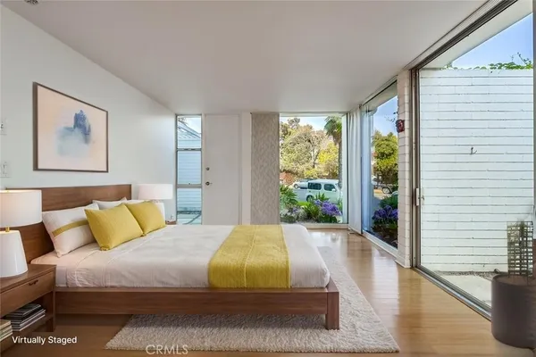 a view of a hallway with washer and dryer