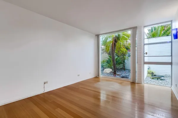 a view of a house with backyard porch and sitting area
