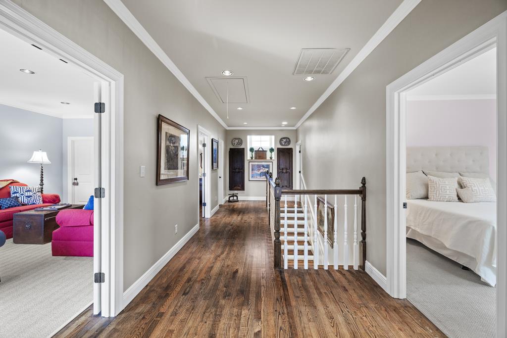 3965 Highway 27 Kerrville, TX 78028 - Photo 30 of 62 a view of a hallway with bedroom and wooden floor