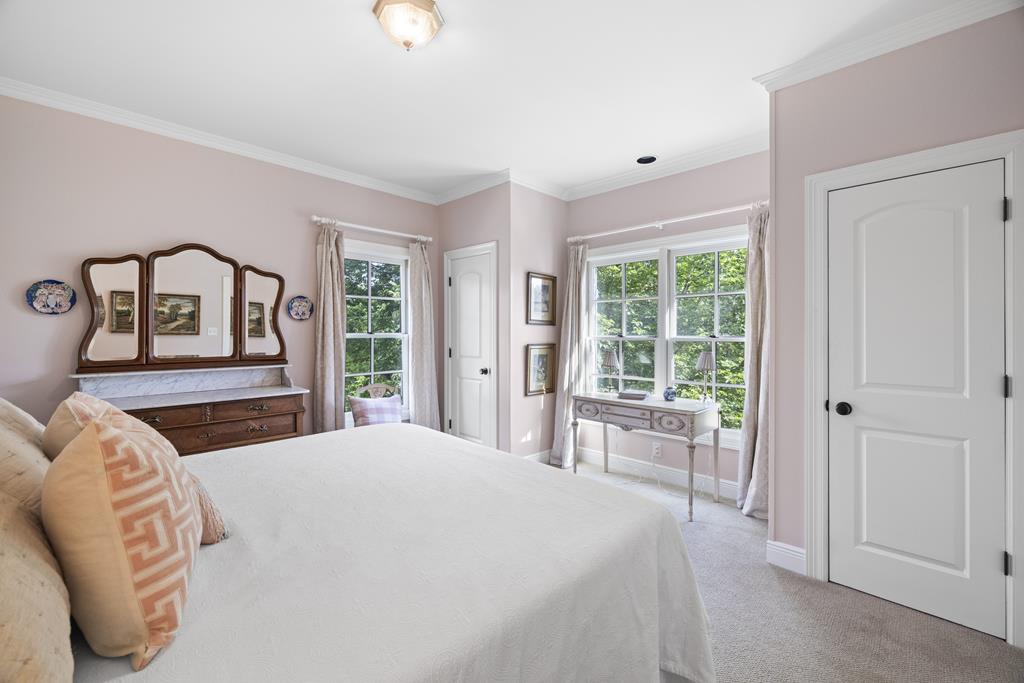 3965 Highway 27 Kerrville, TX 78028 - Photo 34 of 62 a bedroom with a large bed and a large window