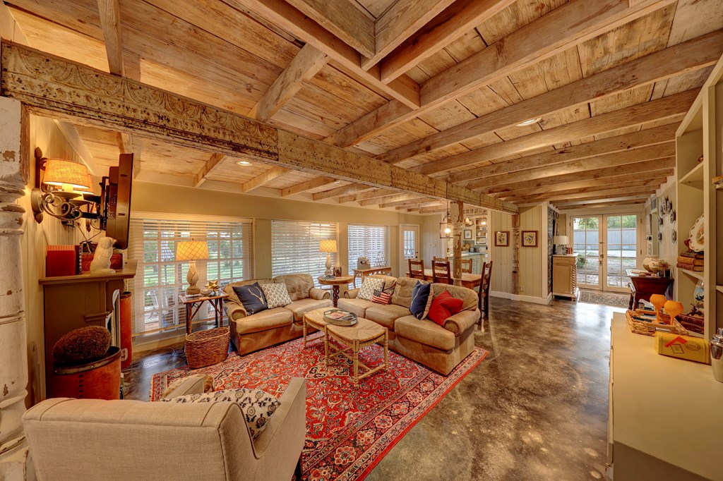 3965 Highway 27 Kerrville, TX 78028 - Photo 49 of 62 a living room with furniture lots of tables and chairs