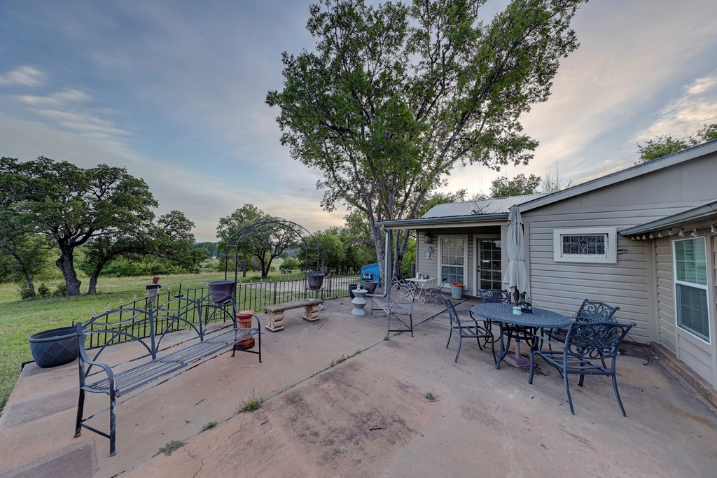 3965 Highway 27 Kerrville, TX 78028 - Photo 55 of 62 a view of a sitting area with furniture in backyard