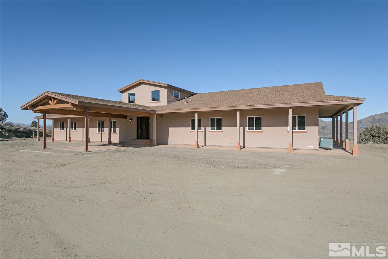 115 Boron Lane Reno, NV 89506 - Photo 3 of 39 a front view of a house with a porch