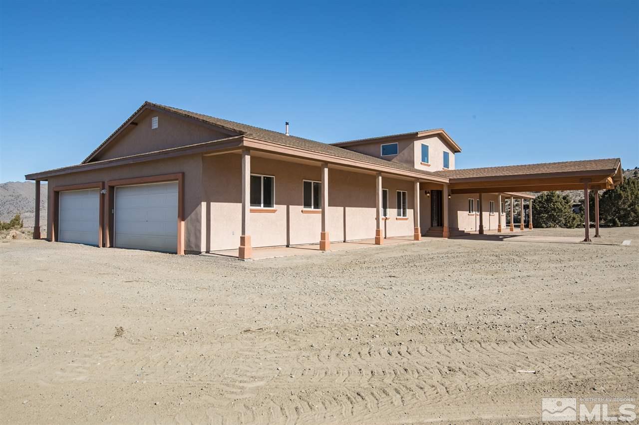 115 Boron Lane Reno, NV 89506 - Photo 36 of 39 a front view of a house with a garage