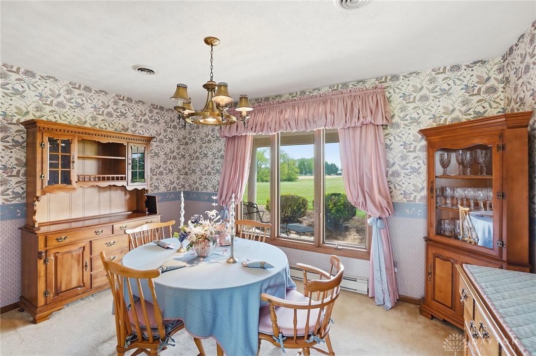 5669 O Neall Road Waynesville, OH 45068 - Photo 21 of 72 This dining room offers scenic outdoor views, perfect for enjoying meals.