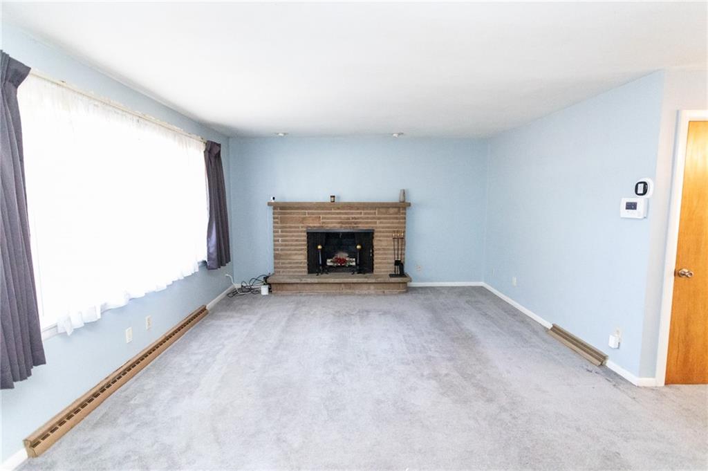 117 Cemetery Road Vanderbilt, PA 15486 - Photo 11 of 25 a view of empty room with fireplace