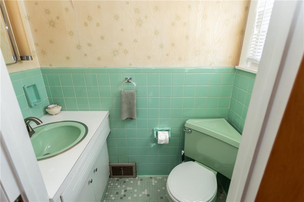 117 Cemetery Road Vanderbilt, PA 15486 - Photo 17 of 25 a bathroom with a toilet and a sink