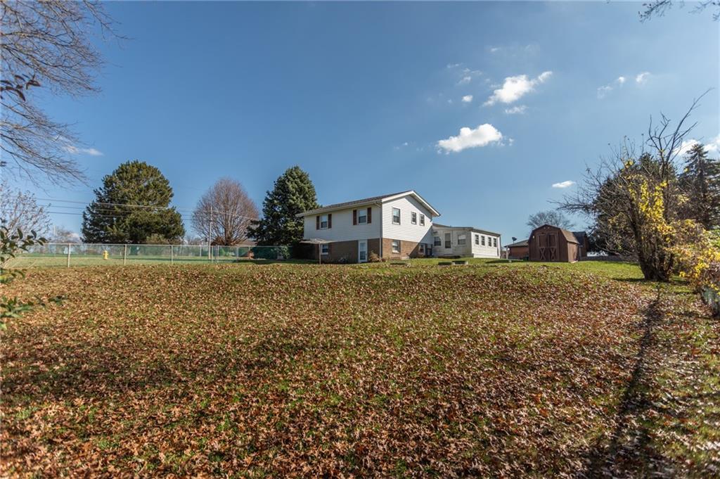 117 Cemetery Road Vanderbilt, PA 15486 - Photo 3 of 25 a view of house and outdoor space